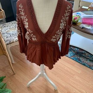 Rust colored long sleeve top